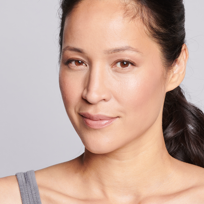 face of female model after applying even up serum  || all